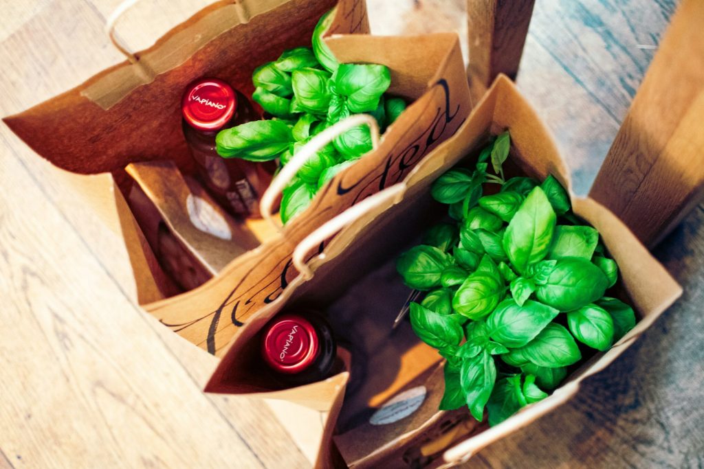 green basil plants in box