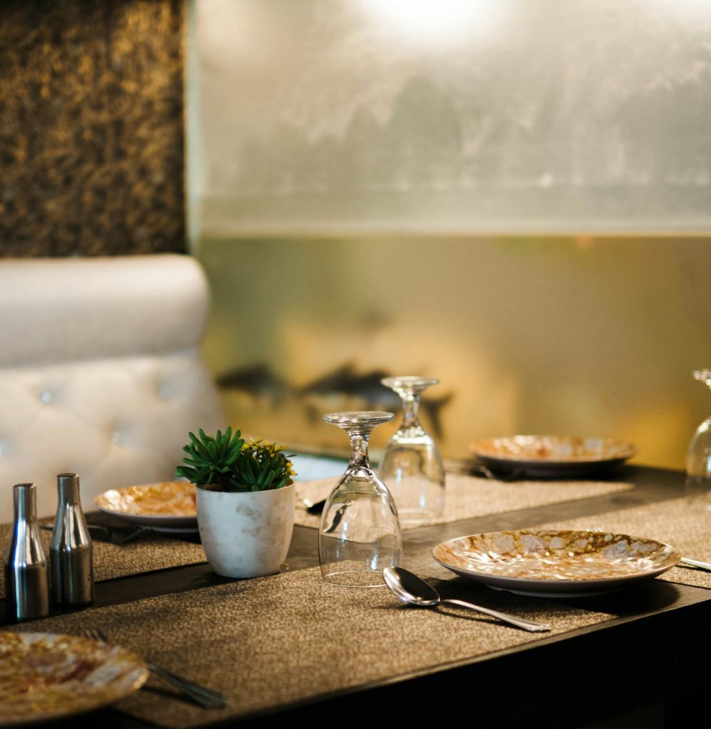 a table with plates and silverware on it